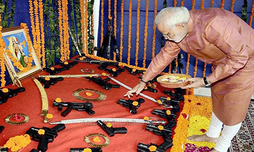 Modi doing pooja for tools